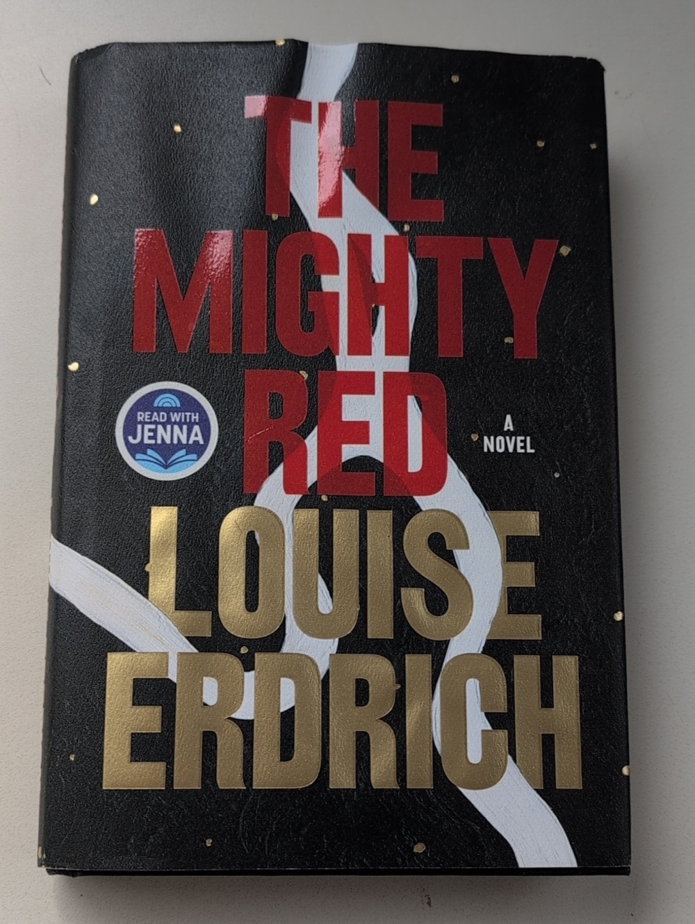 The Mighty Red by Louise Erdrich - Black, Red & Gold Hardcover